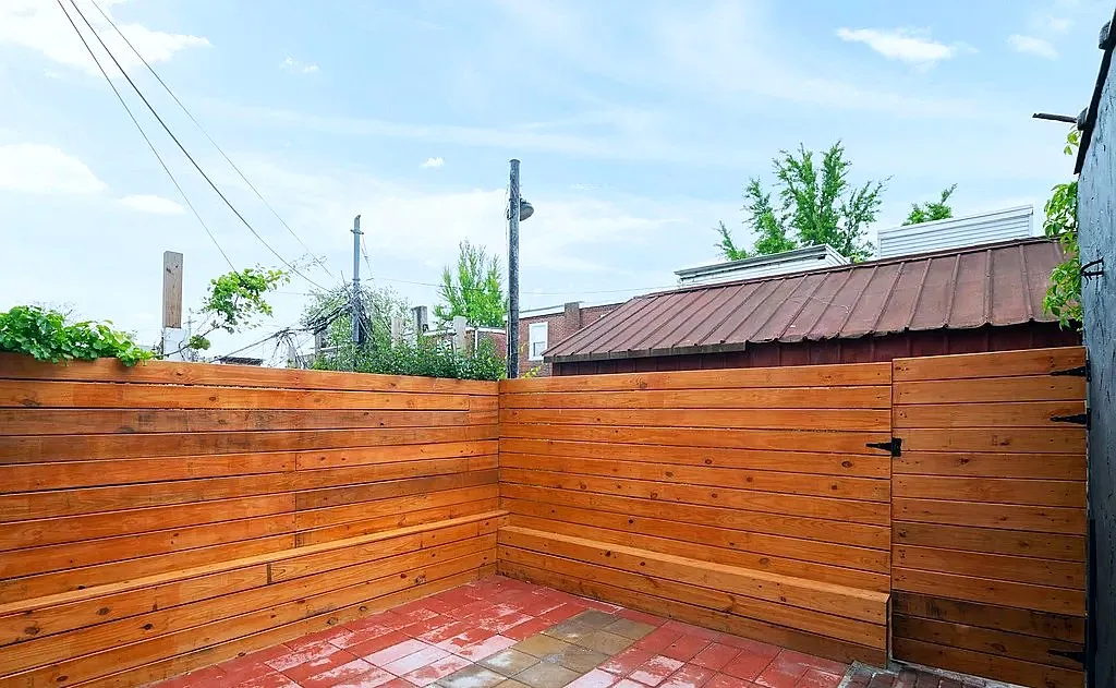Rear patio with new cedar fence and pavers