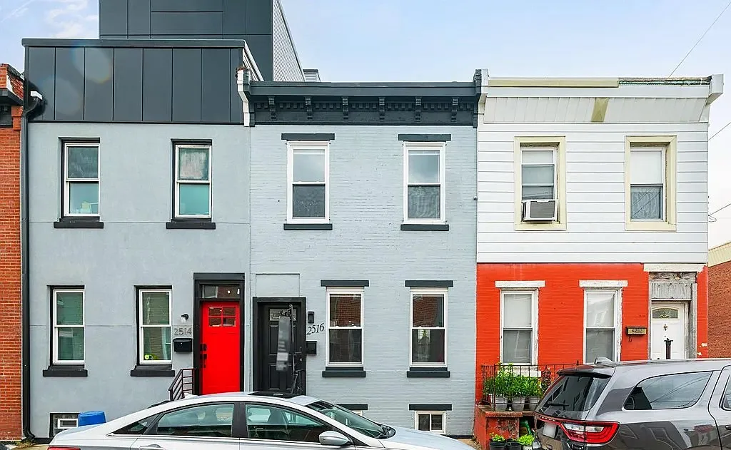 Street view of the renovated rowhouse facade