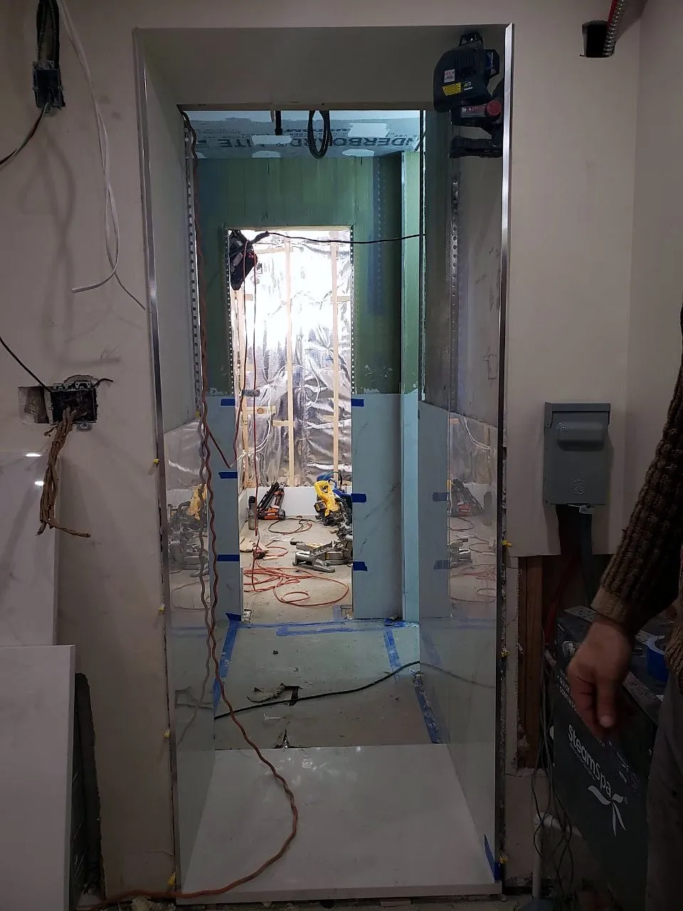 Sauna framing and electrical rough-in with glass panel set
